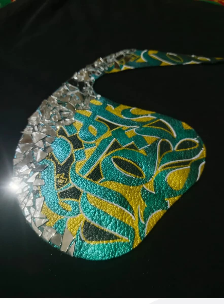 Aaina — mirror shards catching light, detail